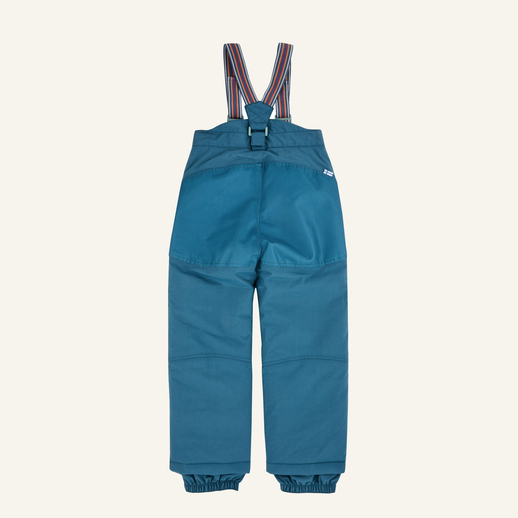 Kids' turquoise overalls with rounded front pockets and colorful striped straps