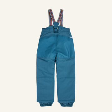 Kids' turquoise overalls with rounded front pockets and colorful striped straps
