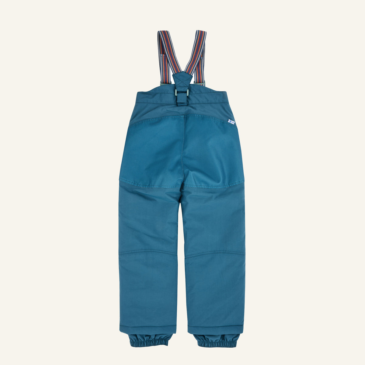 Kids' turquoise overalls with rounded front pockets and colorful striped straps