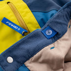 Snow pants with a yellow-blue front panel, fleece cuffs, and snap button